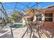 Enjoy the Florida sunshine in this screened pool area with seating at 26081 Templar Ln, Punta Gorda, FL 33983