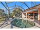 Refreshing kidney-shaped pool, screened for ultimate privacy at 26081 Templar Ln, Punta Gorda, FL 33983