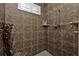 Large walk-in shower with tiled walls and built-in seat at 26081 Templar Ln, Punta Gorda, FL 33983
