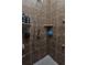 Large walk-in shower with multiple shower heads and tiled walls at 26081 Templar Ln, Punta Gorda, FL 33983