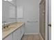 Bathroom with updated vanity and walk-in shower at 26155 Explorer Rd # 1C, Punta Gorda, FL 33983