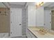 Clean bathroom with a vanity, toilet and storage at 26155 Explorer Rd # 1C, Punta Gorda, FL 33983