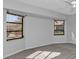 Bright bedroom with large windows and ceiling fan at 26155 Explorer Rd # 1C, Punta Gorda, FL 33983