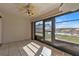 Bright Florida room with tiled floor and access to backyard at 26155 Explorer Rd # 1C, Punta Gorda, FL 33983