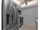 Kitchen with stainless steel appliances and light wood cabinets at 26155 Explorer Rd # 1C, Punta Gorda, FL 33983