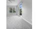 Primary bedroom with ample natural light and sliding doors at 3116 Silkwood Ln, Port Charlotte, FL 33953