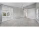 Spacious bedroom with carpet flooring and sliding glass doors at 3116 Silkwood Ln, Port Charlotte, FL 33953