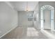 Bright dining room with a chandelier and window with blinds at 3116 Silkwood Ln, Port Charlotte, FL 33953