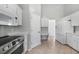 Bright kitchen features stainless steel appliances and ample cabinetry at 3116 Silkwood Ln, Port Charlotte, FL 33953