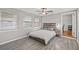 Bedroom with queen bed, hardwood floors, and ceiling fan at 330 45Th S St, St Petersburg, FL 33711