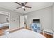 Comfortable bedroom with TV and access to another room at 330 45Th S St, St Petersburg, FL 33711