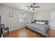Bright bedroom with hardwood floors and ceiling fan at 330 45Th S St, St Petersburg, FL 33711