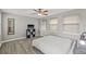 Bright bedroom with queen bed, hardwood floors, and ceiling fan at 330 45Th S St, St Petersburg, FL 33711