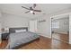 Main bedroom with hardwood floors and mirrored closet at 330 45Th S St, St Petersburg, FL 33711