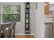 Black floating shelves add style and storage to the dining area at 330 45Th S St, St Petersburg, FL 33711