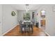 Charming dining room features hardwood floors and a table with four chairs at 330 45Th S St, St Petersburg, FL 33711