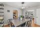 Dining room with hardwood floors, kitchen and living room views at 330 45Th S St, St Petersburg, FL 33711