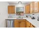 Kitchen with light wood cabinets, stainless steel appliances at 330 45Th S St, St Petersburg, FL 33711