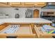 Open drawers with organized cutlery and utensils at 330 45Th S St, St Petersburg, FL 33711