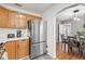 Stainless steel appliances and light wood cabinets highlight this kitchen at 330 45Th S St, St Petersburg, FL 33711
