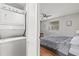 Stackable washer and dryer in a small laundry room at 330 45Th S St, St Petersburg, FL 33711