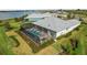 Aerial view showing the home, pool, and backyard at 43474 Waterside Trl, Punta Gorda, FL 33982