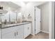 Bathroom with double vanity and granite countertop at 44197 Frontier Dr, Punta Gorda, FL 33982