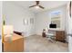 Home office or bedroom with carpeted floor, desk and chair, and ceiling fan at 44197 Frontier Dr, Punta Gorda, FL 33982