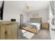 Spacious bedroom with large bed and wood furniture at 44197 Frontier Dr, Punta Gorda, FL 33982