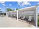 Private cabanas with lounge chairs for poolside relaxation at 44197 Frontier Dr, Punta Gorda, FL 33982