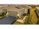 Single-story home with solar panels, attached garage, and landscaped walkway at 44197 Frontier Dr, Punta Gorda, FL 33982