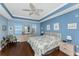 Main bedroom with king-size bed and water views at 5116 Melbourne St # B201, Punta Gorda, FL 33980