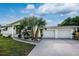 Charming single story home with two car garage and lush landscaping at 621 Sturgeon Pl, Punta Gorda, FL 33950