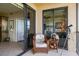 Relaxing balcony with wicker chair at 900 E Marion Ave # 1403, Punta Gorda, FL 33950
