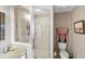 Bathroom with shower and toilet at 900 E Marion Ave # 1403, Punta Gorda, FL 33950