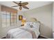 Cozy bedroom with ceiling fan at 900 E Marion Ave # 1403, Punta Gorda, FL 33950
