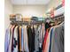 Spacious walk-in closet with ample shelving and hanging space at 900 E Marion Ave # 1403, Punta Gorda, FL 33950
