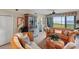 Bright living room with bay window and water views at 900 E Marion Ave # 1403, Punta Gorda, FL 33950