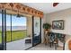 Living area with balcony access and stunning water views at 900 E Marion Ave # 1403, Punta Gorda, FL 33950