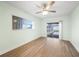 Bedroom with sliding glass doors leading to a private pool, perfect for relaxation and entertainment at 115 Leland Se St, Port Charlotte, FL 33952