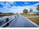 Stroll along the wood dock to the boat as you enjoy beautiful canal views at 115 Leland Se St, Port Charlotte, FL 33952