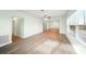 Open layout with modern flooring, bright walls, and a large window with a view at 115 Leland Se St, Port Charlotte, FL 33952