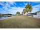 Waterfront property with grassy yard at 115 Leland Se St, Port Charlotte, FL 33952