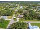 Aerial view of home and surrounding area at 1160 Rizzo St, Port Charlotte, FL 33952