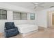 Bright bedroom with window coverings, ceiling fan and room for a king-size bed at 1160 Rizzo St, Port Charlotte, FL 33952