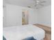 Spacious bedroom with a large bed, ceiling fan and access to a bathroom at 1160 Rizzo St, Port Charlotte, FL 33952