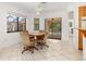 Casual dining area with sliding doors leading to the backyard at 1160 Rizzo St, Port Charlotte, FL 33952