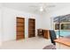 Home office with built-in shelving and view of the pool at 1160 Rizzo St, Port Charlotte, FL 33952