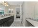 Double vanity bathroom with granite countertop at 1169 Red Oak Rd, North Port, FL 34288