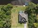 Property has canal access and a large yard at 1228 Eppinger Dr, Port Charlotte, FL 33953